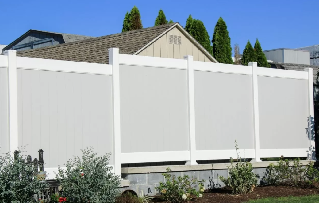 vinyl fences in a yard